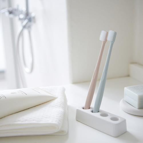 White Yamazaki Ceramic Toothbrush Holder